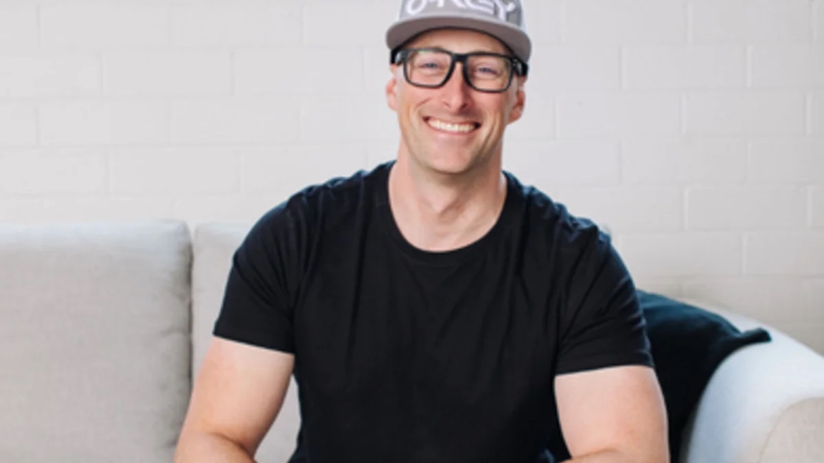 Steve Corney, co-founder of The Legacy Studio, smiling in a casual portrait.